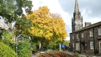 Burley in Wharfedale church in autumn