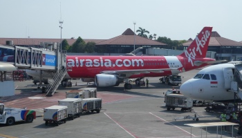 An Air Asia A320 airplane at the gate